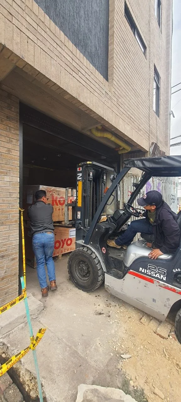 Material delivery at building access with forklift